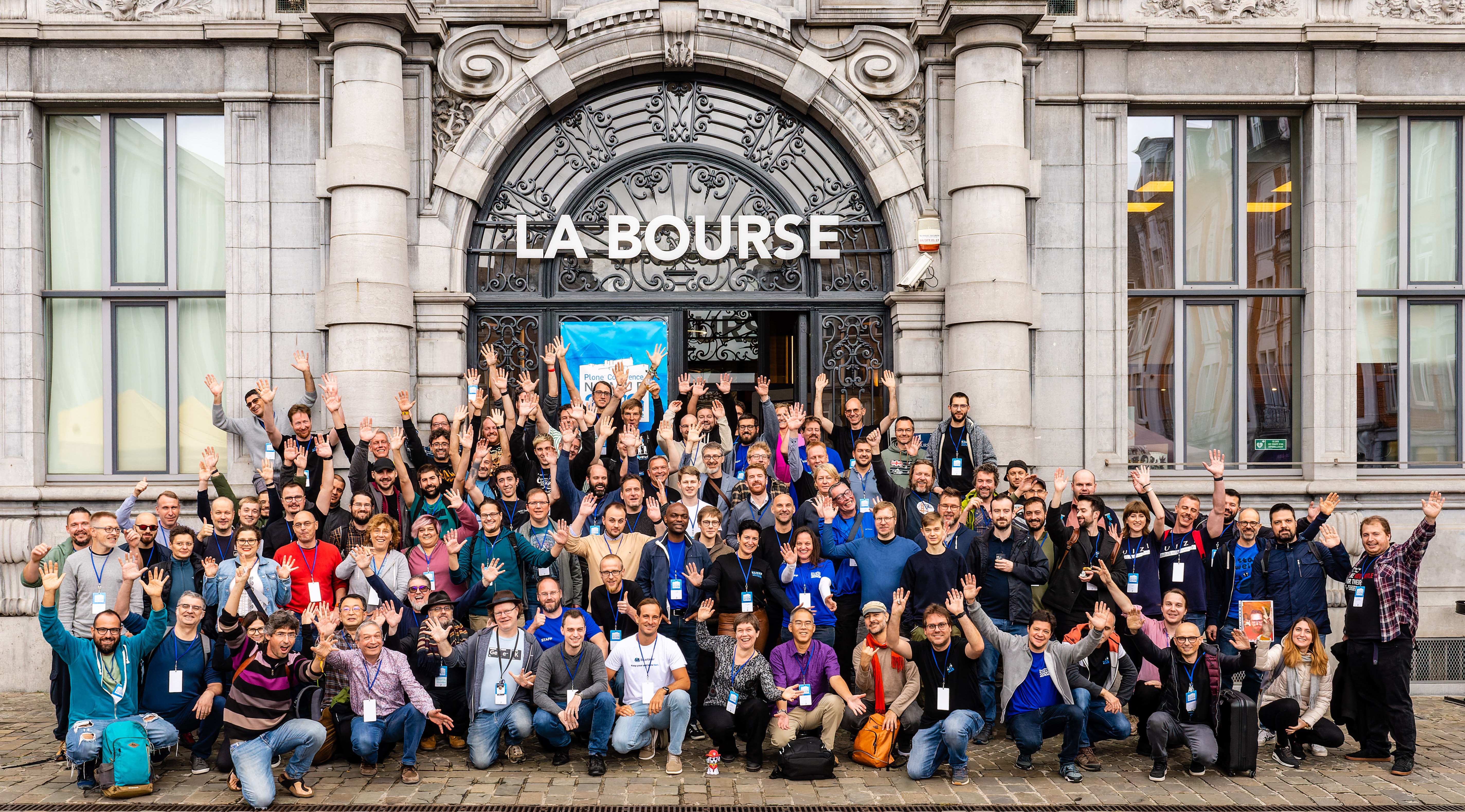 Plone Conference 2022 group photo in front of La Bourse in Namur
